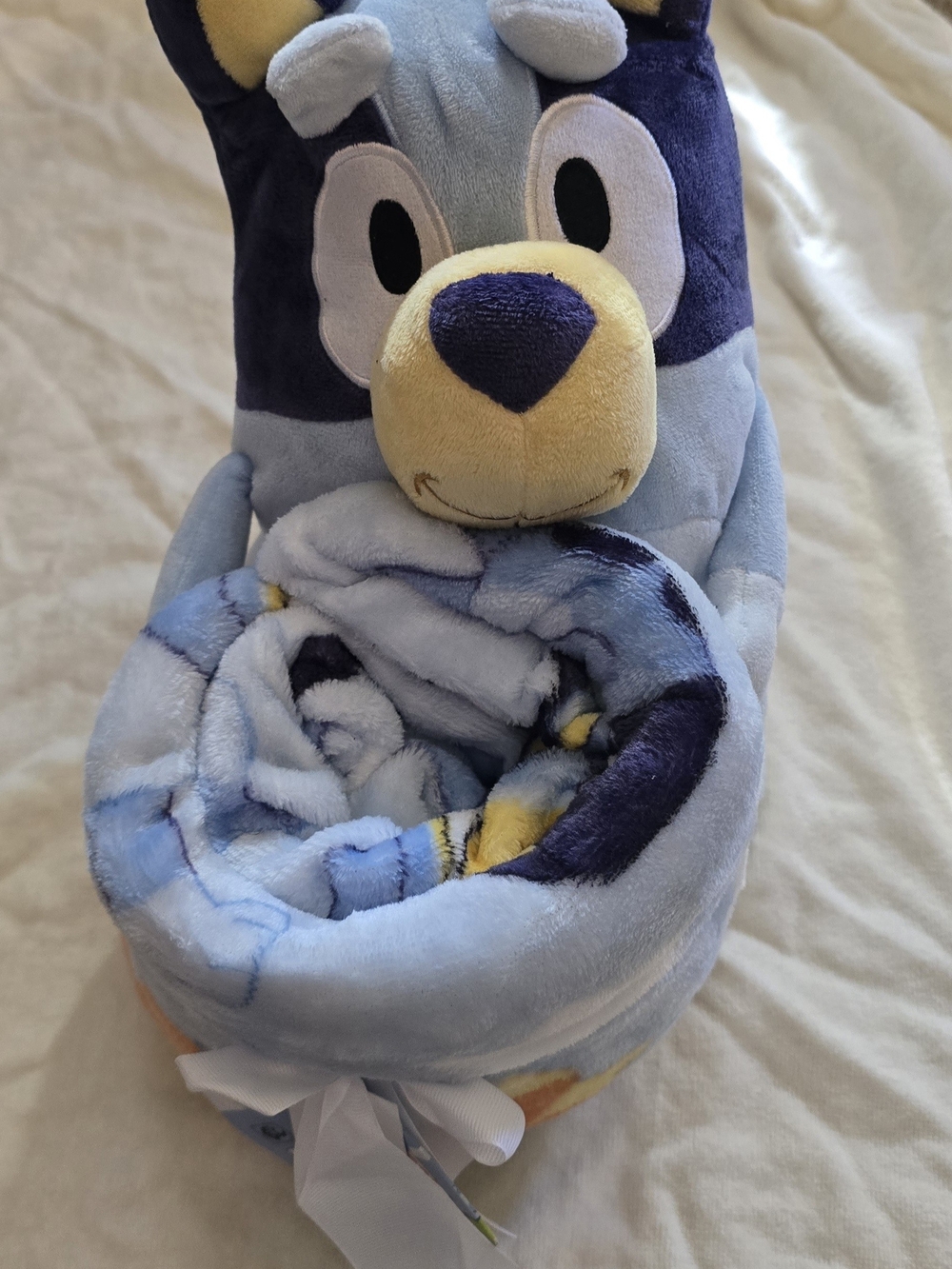 Plush Puppy Roll-Up Throw Blanket in Light Blue, Navy & Yellow